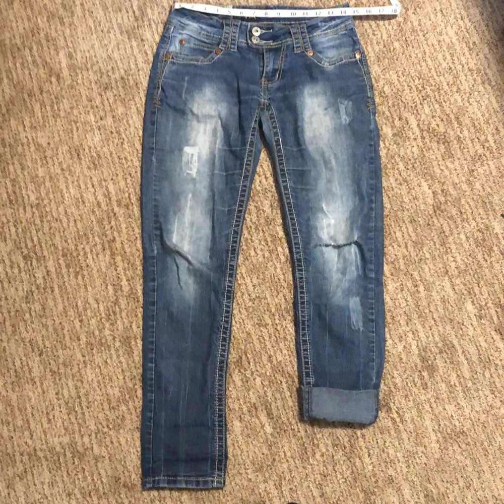 Distressed Low to Mid-Rise Jeans